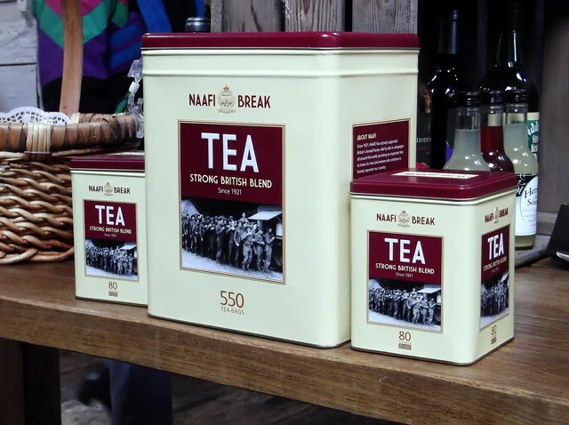tea, tins, marketing, container, red, named, canned, lid, product, object, packaging, shiny, tinned, cylinder, label, canister, aluminum, goods, three, multiple. Keeping product promises consistent across channels